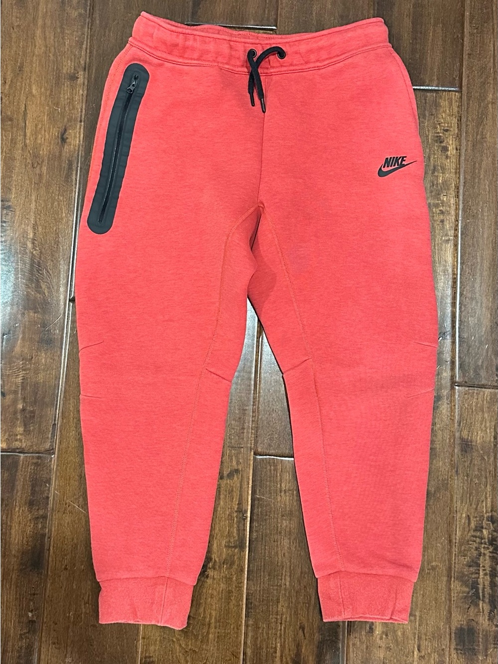 Nike Tech Fleece Joggers - youth medium. Red and black.